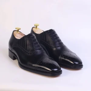 Black brogue toe cap Oxfords